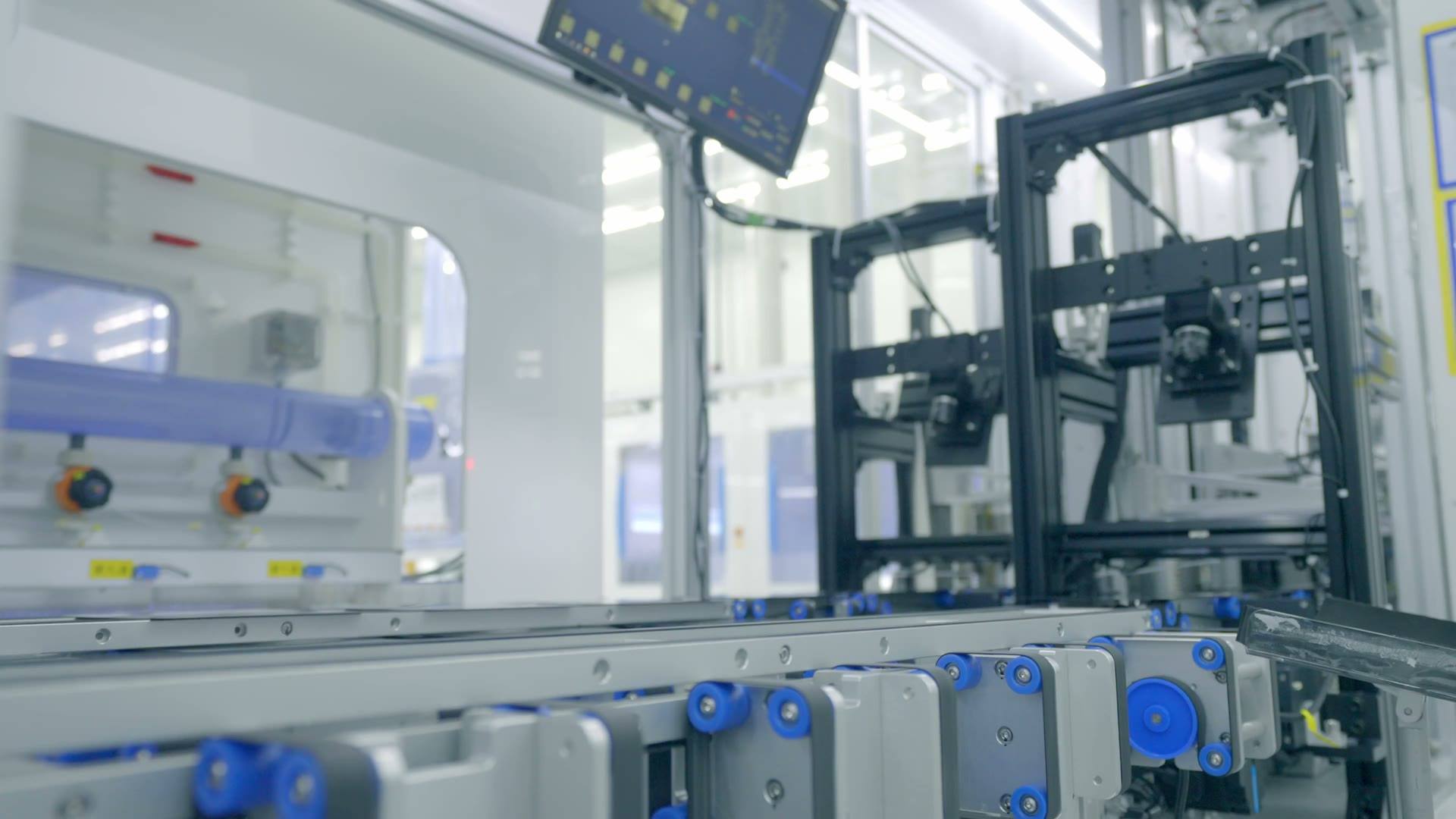 An automated conveyor line carrying panels between machines